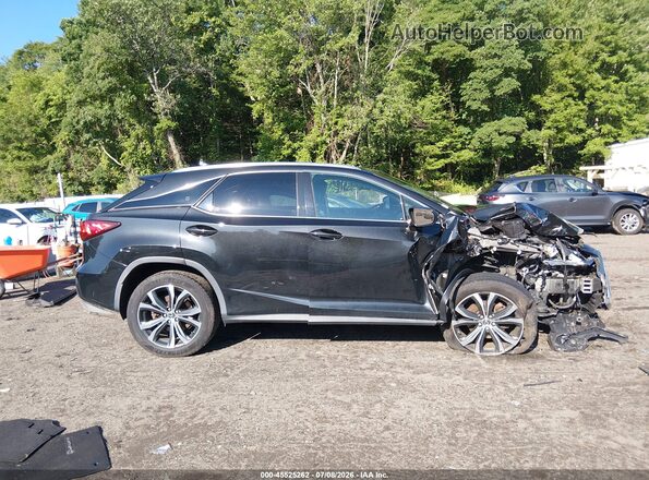 JTJBZMCA7K2042017 2019 LEXUS RX 350 Black Widok wnętrza z tyłu