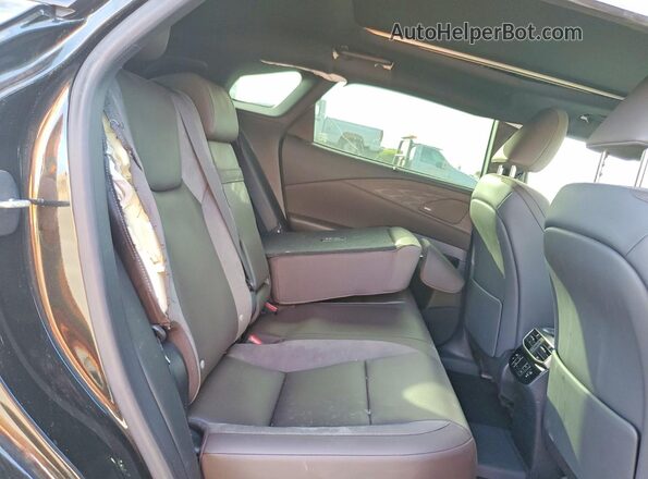 JTJCJMGA2S2026488 2025 LEXUS RX Black Vista interior trasera