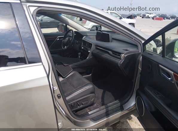 JTJDZKCA2J2007669 2018 LEXUS RX 350L Gold Вид салону спереду