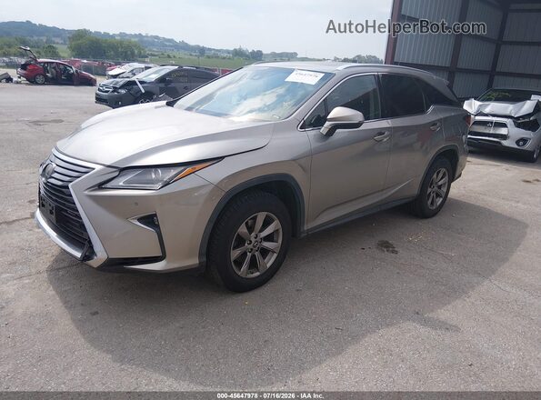 JTJDZKCA2J2007669 2018 LEXUS RX 350L Gold Передня ліва чверть