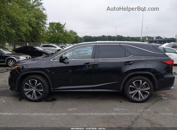 JTJDZKCA6J2003950 2018 LEXUS RX 350L Black Vista interior trasera