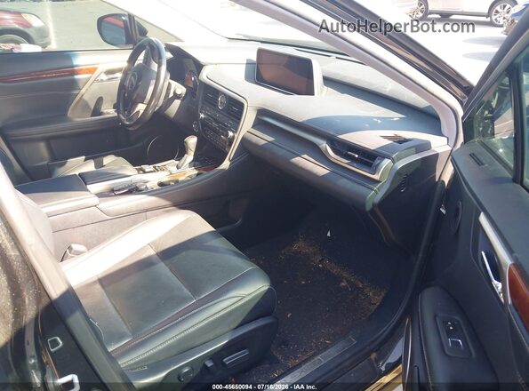 JTJDZKCA7J2008025 2018 LEXUS RX 350L Black Вид салону спереду