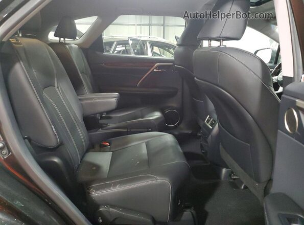 JTJDZKCA9J2009161 2018 LEXUS RX Black Vista interior trasera