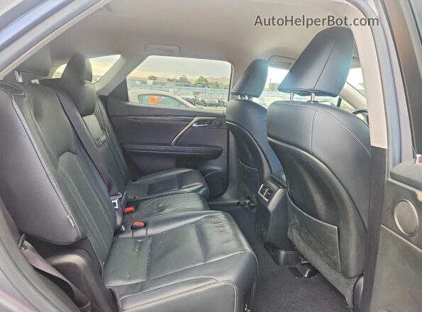 JTJDZKCAXJ2001196 2018 LEXUS RX Gray Vista interior trasera