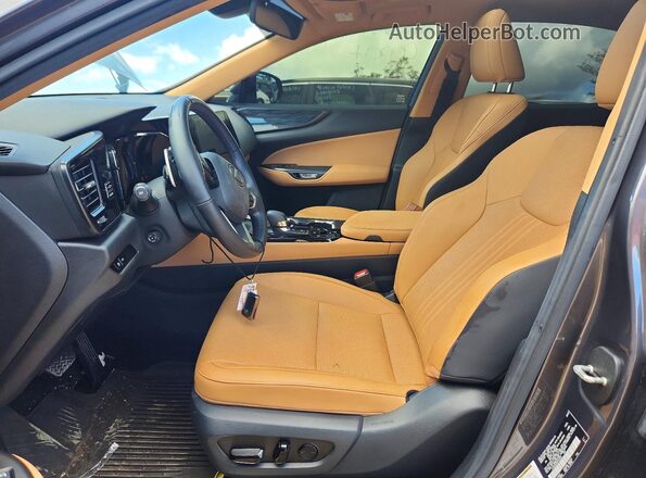 JTJGDCAZ8R2010534 2024 LEXUS NX Charcoal Front interior view