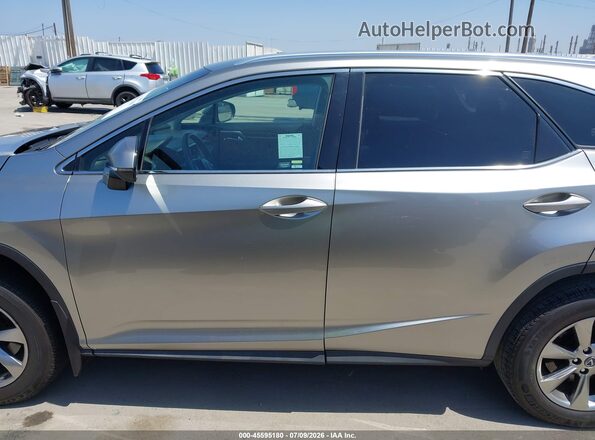 JTJGZKCAXK2010544 2019 LEXUS RX 350L Gray 