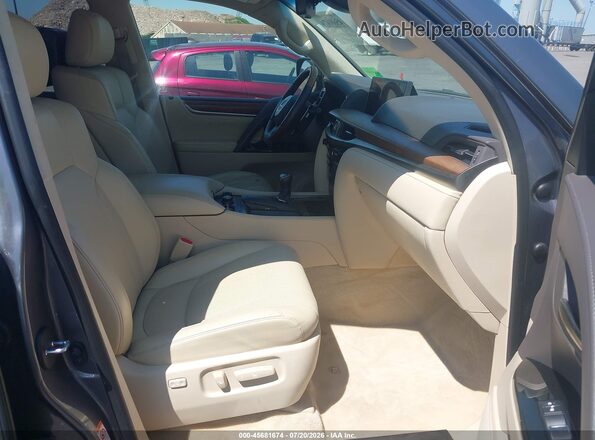 JTJHY7AX4H4226494 2017 LEXUS LX 570 Серый Вид салона спереди