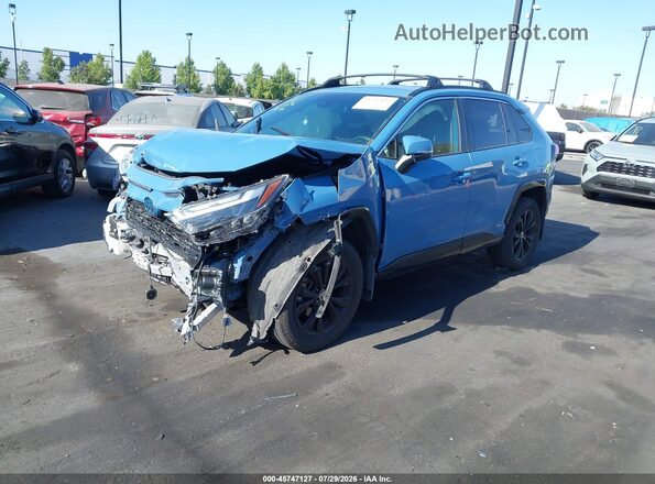 JTM16RFV4ND524908 2022 TOYOTA RAV4 HYBRID Blue Передня ліва чверть