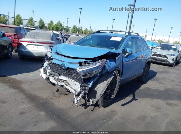 JTM16RFV4ND524908 2022 TOYOTA RAV4 HYBRID Blue 