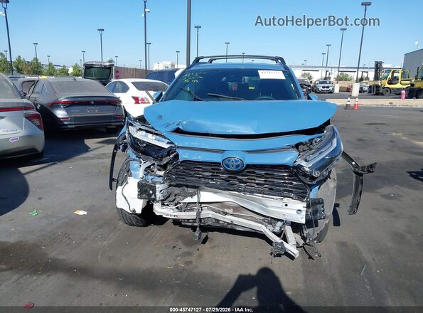 JTM16RFV4ND524908 2022 TOYOTA RAV4 HYBRID Blue Вид задньої частини салону