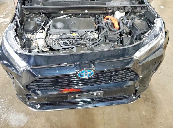 JTM16RFV8PD079320 2023 TOYOTA RAV4 Black Vista interior trasera