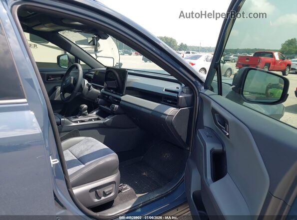 JTM6CRAV6TD000419 2026 TOYOTA RAV4 Синий Вид салона спереди
