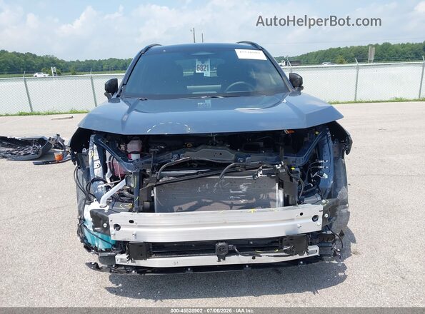 JTM6CRAV6TD000419 2026 TOYOTA RAV4 Синий Вид задней части салона