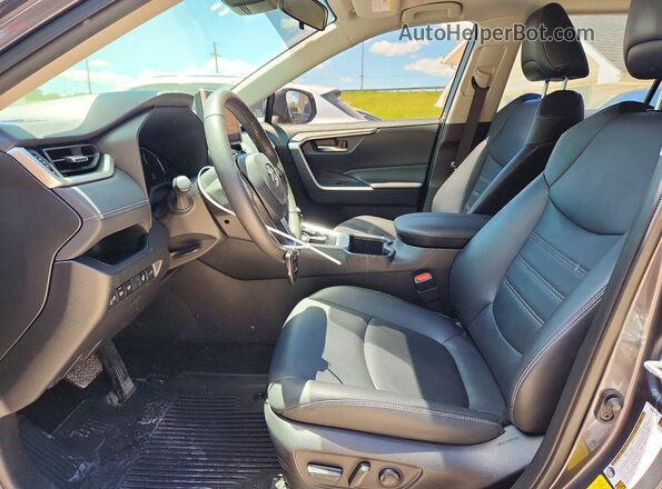 JTMA1RFV1PD094725 2023 TOYOTA RAV4 Gray Front interior view