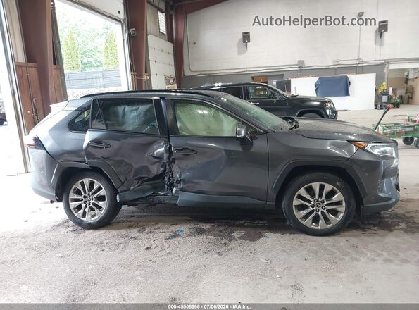 JTMA1RFV2KD010422 2019 TOYOTA RAV4 Gray უკანა სალონის ხედი