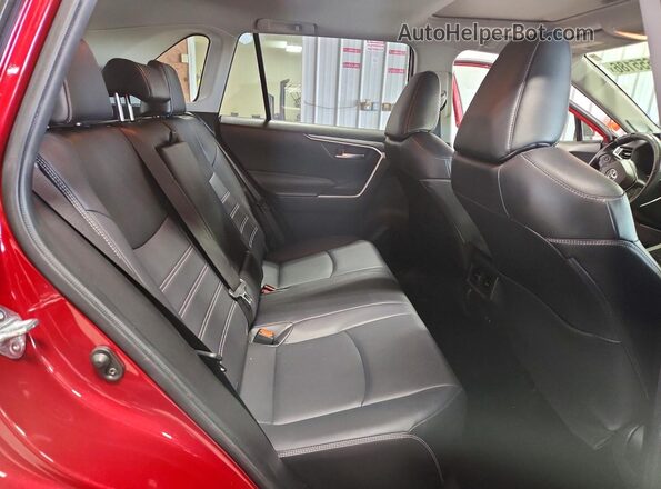 JTMA1RFV4KD515264 2019 TOYOTA RAV4 Red Rear seats view