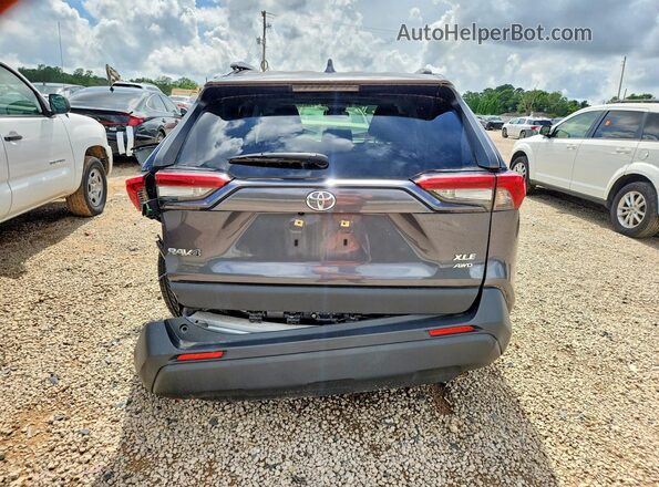 JTMA1RFV5KD026078 2019 TOYOTA RAV4 Gray Rear view