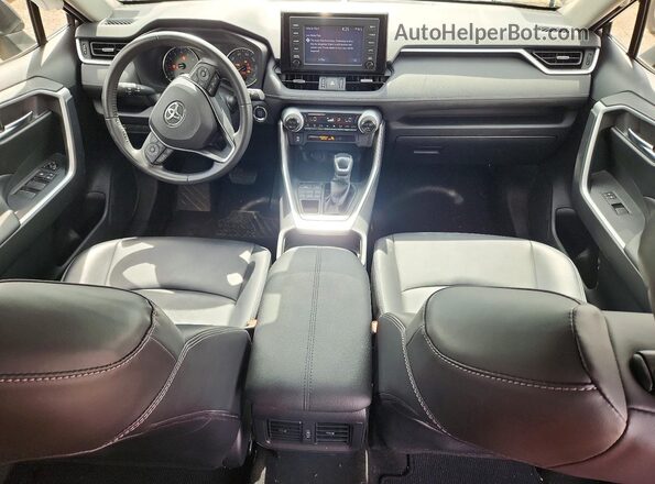 JTMA1RFV5KD026078 2019 TOYOTA RAV4 Gray Dashboard view