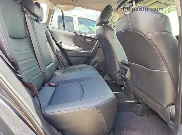 JTMA1RFV5KD026078 2019 TOYOTA RAV4 Gray Rear interior view