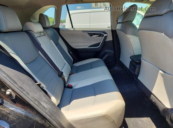 JTMA1RFV7KJ019053 2019 TOYOTA RAV4 Black Вид задньої частини салону