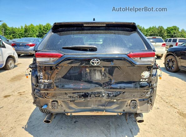 JTMA1RFV7KJ019053 2019 TOYOTA RAV4 Black Вид ззаду