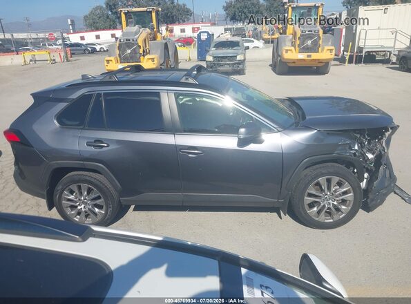 JTMA1RFV7LD528995 2020 TOYOTA RAV4 Gray Vista interior trasera