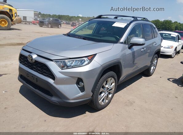 JTMA1RFV9KD024057 2019 TOYOTA RAV4 Silver Առջևի ձախ երեք քառորդ տեսարան