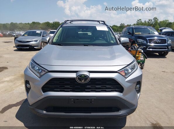 JTMA1RFV9KD024057 2019 TOYOTA RAV4 Silver Սարքավորումների վահանակի տեսք