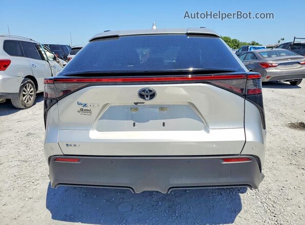 JTMAAAAA7RA041201 2024 TOYOTA BZ4X Серебряный Вид сзади