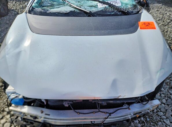 JTMABABA0RA076044 2024 SUBARU SOLTERRA White Widok komory silnika