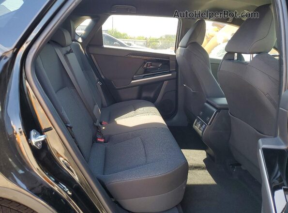 JTMABABA7RA068197 2024 SUBARU SOLTERRA Черный Вид задней части салона