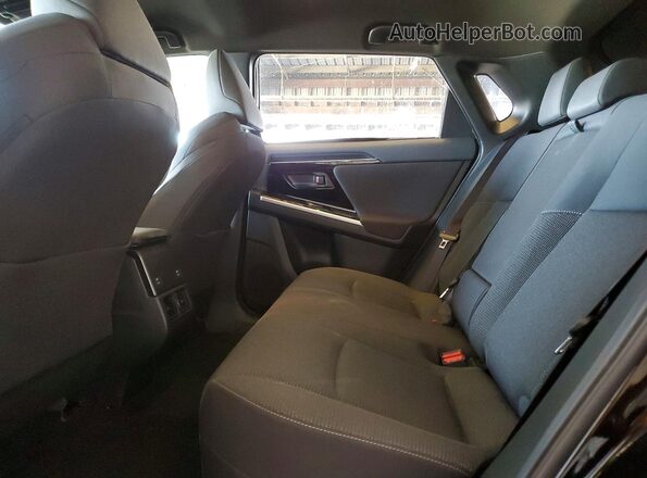 JTMABABA9SA099568 2025 SUBARU SOLTERRA Черный Вид задней части салона