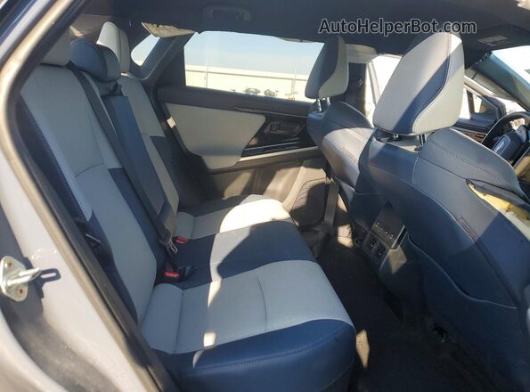 JTMABABAXRA065889 2024 SUBARU SOLTERRA Gray Vista interior trasera