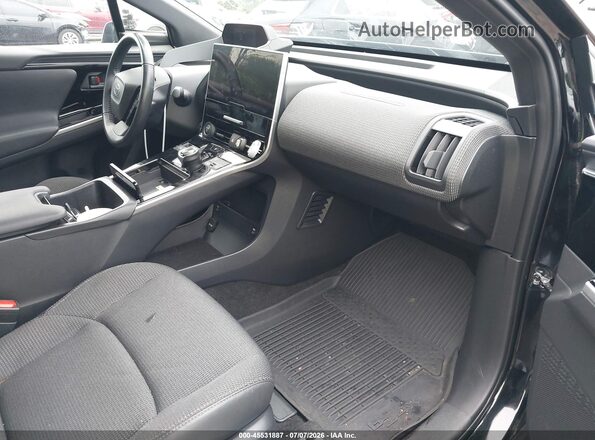 JTMABACA8PA038752 2023 TOYOTA BZ4X Серый Вид салона спереди