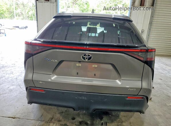 JTMABACA9RA065476 2024 TOYOTA BZ4X Silver Հետևի տեսք