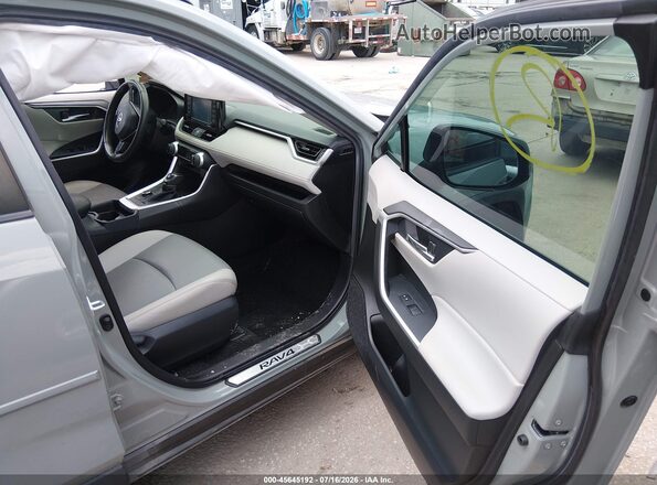 JTMB6RFV0MD504710 2021 TOYOTA RAV4 HYBRID Pewter Widok wnętrza z przodu
