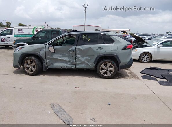 JTMB6RFV0MD504710 2021 TOYOTA RAV4 HYBRID Pewter Widok wnętrza z tyłu
