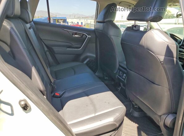 JTMB6RFV0PD084399 2023 TOYOTA RAV4 Green Vista interior trasera