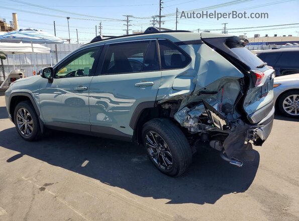 JTMB6RFV0PD084399 2023 TOYOTA RAV4 Green Trasero izquierdo