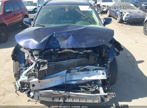JTMB6RFV1RD135329 2024 TOYOTA RAV4 HYBRID Blue Widok wnętrza z tyłu