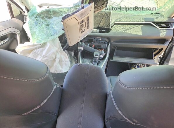 JTMB6RFV2RD138868 2024 TOYOTA RAV4 White Dashboard view