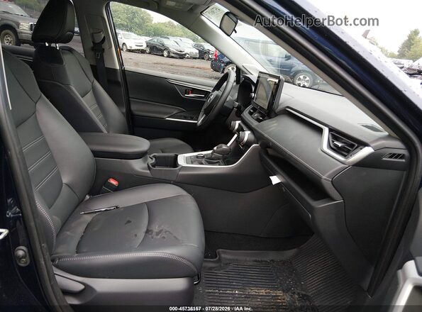 JTMB6RFV2SJ090019 2025 TOYOTA RAV4 HYBRID Dark Blue Front interior view