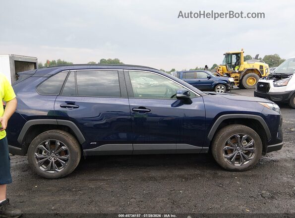 JTMB6RFV2SJ090019 2025 TOYOTA RAV4 HYBRID Dark Blue Rear interior view