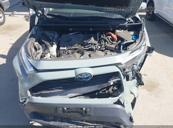 JTMB6RFV4PD088925 2023 TOYOTA RAV4 HYBRID Gray Rear view