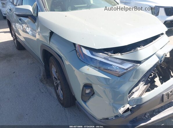 JTMB6RFV4PD088925 2023 TOYOTA RAV4 HYBRID Gray Rear interior view