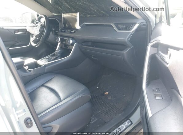 JTMB6RFV4PD088925 2023 TOYOTA RAV4 HYBRID Gray Front interior view