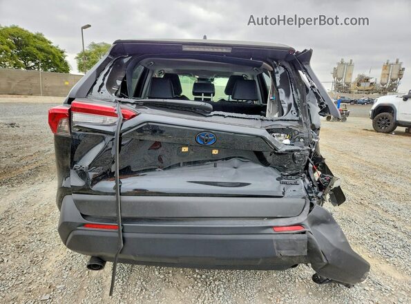 JTMB6RFV4RD129749 2024 TOYOTA RAV4 Black Հետևի տեսք