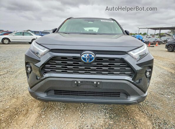JTMB6RFV4RD129749 2024 TOYOTA RAV4 Black Դիմացի տեսք