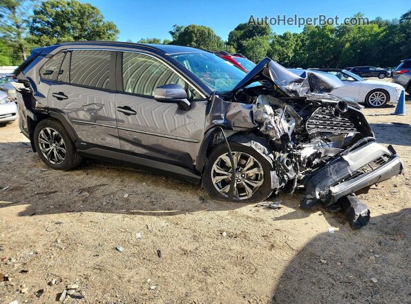 JTMB6RFV7RD127509 2024 TOYOTA RAV4 Charcoal Front right