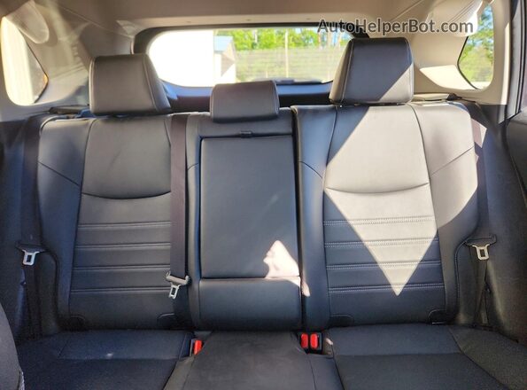 JTMB6RFV7RD127509 2024 TOYOTA RAV4 Charcoal Rear seats view